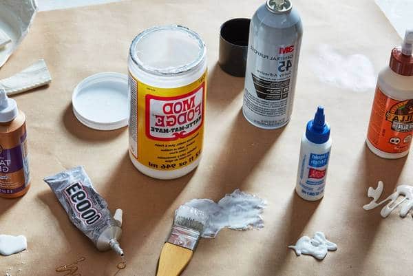 What can I use to glue paper to glass?